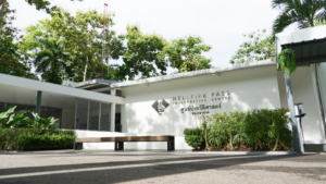 Minimalist white building marked Hellfire Pass Interpretive centre