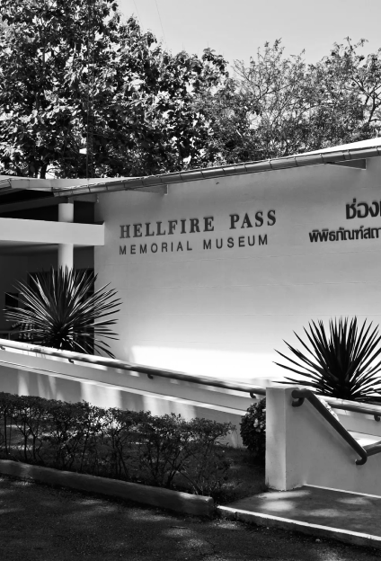 Minimalist white building marked Hellfire Pass Interpretive centre.