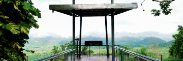 Hellfire Pass Interpretive Centre | Planning your trip Viewing platform overlooking foggy mountains and trees.