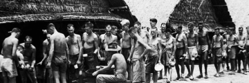 Hellfire Pass Interpretive Centre | Planning your trip A group of prisoner of wars in a line up for a mess parade.