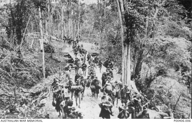 A group of prisoner of wars marching to a new camp site.