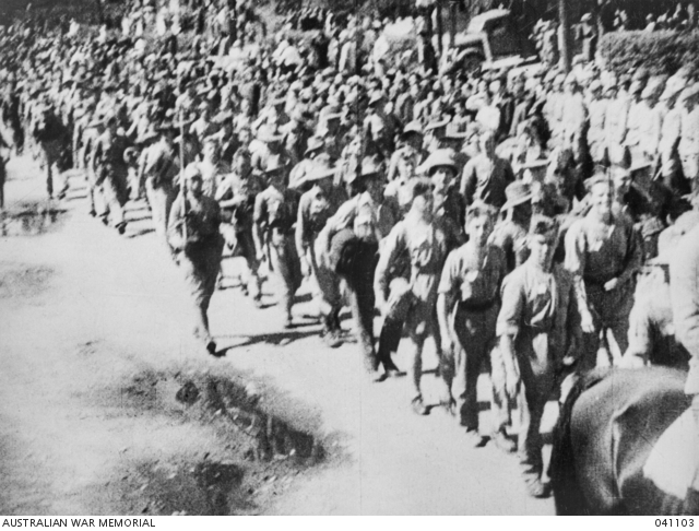Large group of prisoners of war marching during WWII