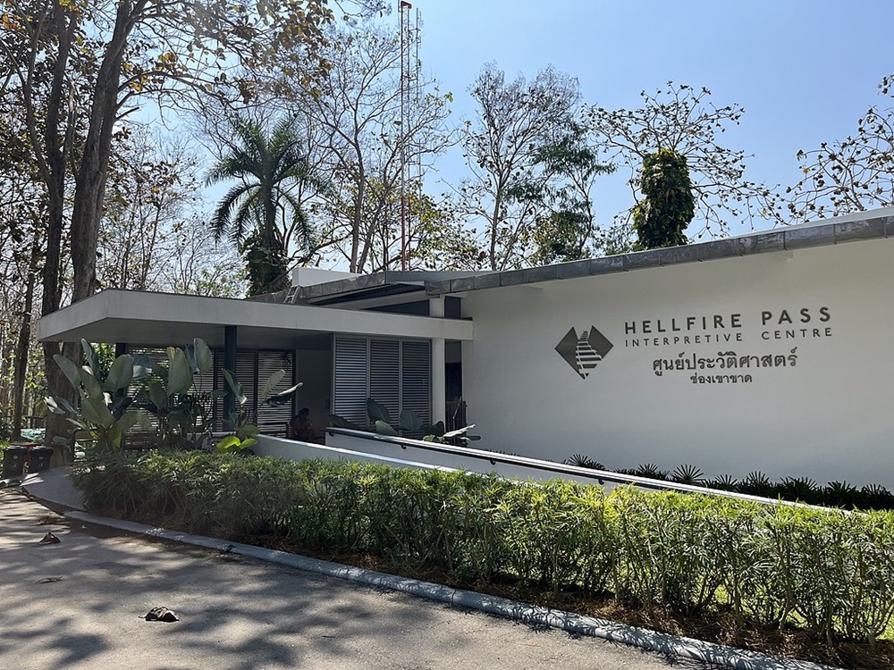 Minimalist white building marked Hellfire Pass Interpretive centre