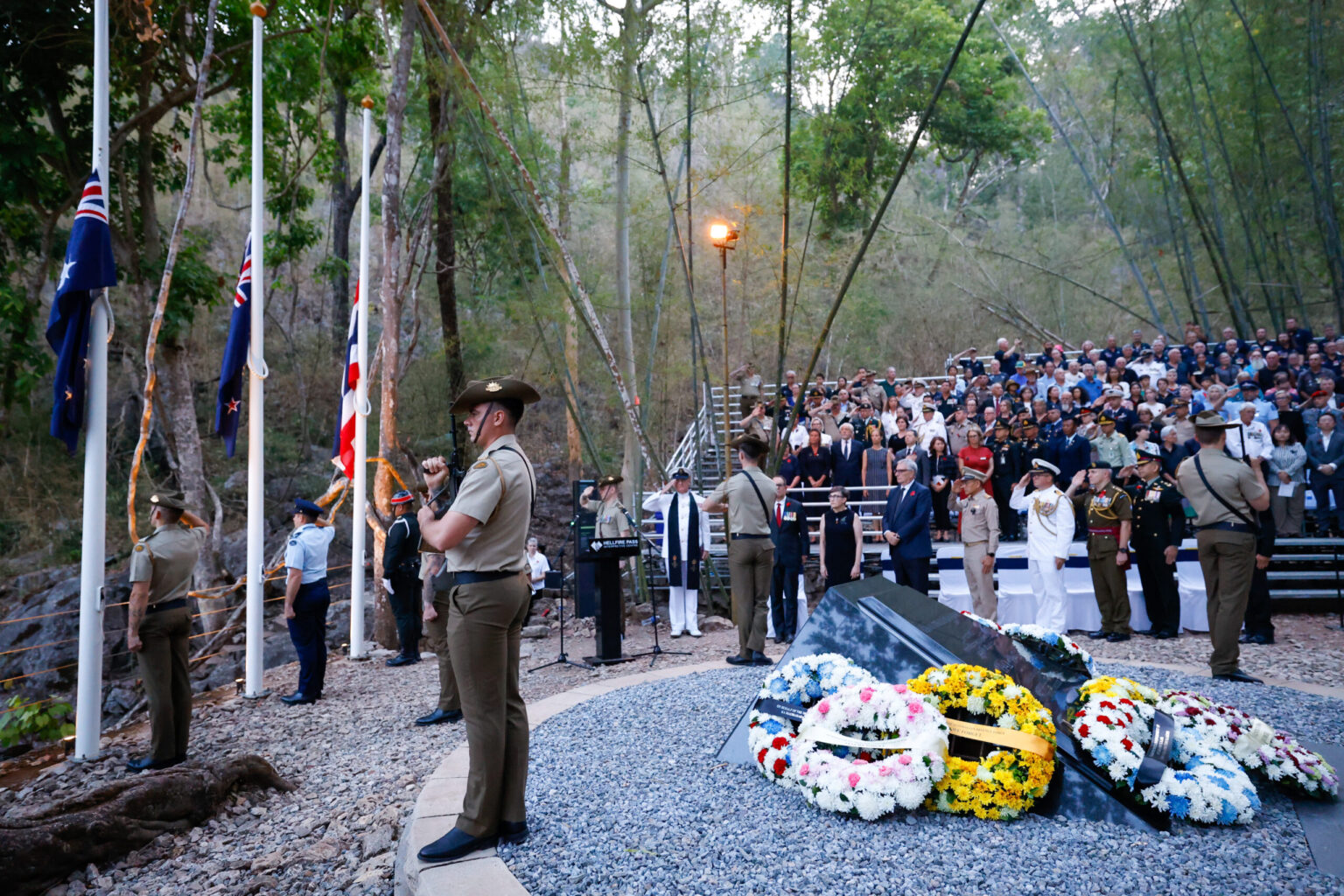 Dawn Service at Hellfire Pass with wreaths laid at the memorial obelisk